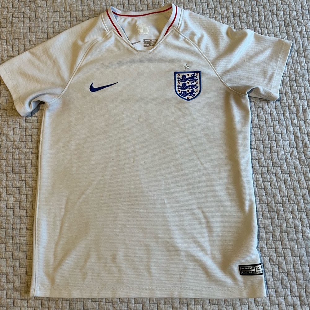 Nike White England Soccer Jersey with Blue Logo and Red Trim